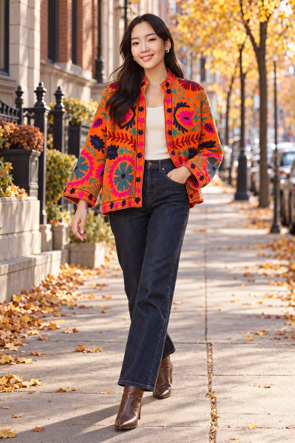 Lux Bou model in the orange Kakoon Suzani velvet jacket on a fall Chicago street